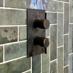 Black bathroom fittings with metro wall tiles, Thomson Properties