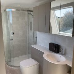 Grey bathroom units - bathroom refurbishment by Thomson Properties