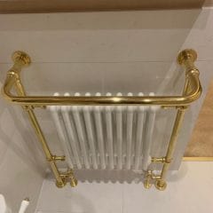 Vintage inspired radiator towel rail with gold surround - Thomson Properties