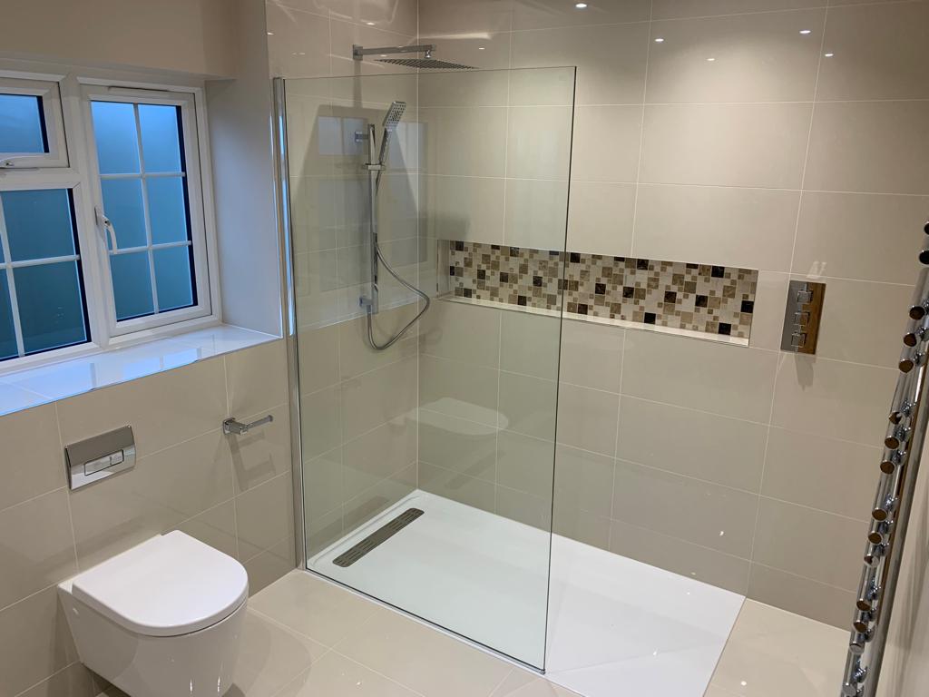 Mosaic tiled niche, shower room refurbishment, bathroom installation in Surrey and Sussex by Thomson Properties