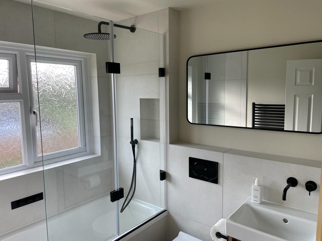 Modern black and white bathroom refurbishment Cranleigh Surrey by Thomson Properties