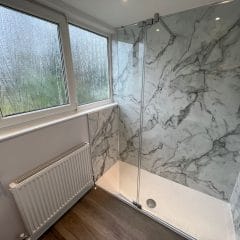 Grey marble tiled bathroom, shower - Thomson Properties