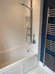Bathroom refurbishment with hexagonal floor tiles - Thomson Properties