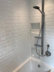 Metro bathroom wall tiles as part of complete bathroom refurbishment by Thomson Properties