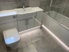 Under unit bathroom lighting fitted by Thomson Properties