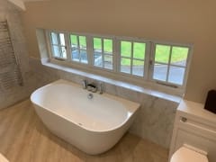Freestanding bath, luxury bathroom refurbishment by Thomson Properties