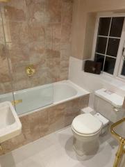 Warm tones in this bathroom refurbishment, Thomson Properties
