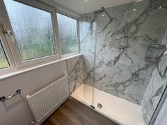 Grey marble tiled bathroom, shower - Thomson Properties