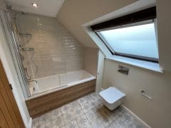 Bathroom installation with patterned floor tiles and metro wall tiles Surrey Thomson Properties