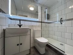 Black & white bathroom refurbishment by Thomson Properties