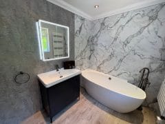 Complete bathroom refurbishment with freestanding bath, by Thomson Properties