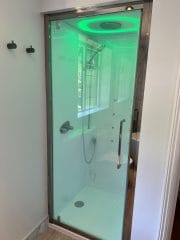 Bathroom refurbishment including  steam shower pod by Thomson Properties