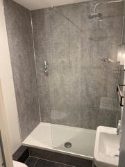 Grey shower area, complete bathroom refurbishment, Thomson Properties