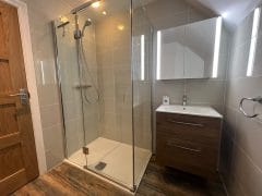 New en suite bathroom installation in Cranleigh, Surrey by Thomson Properties