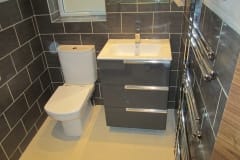Wall hung bathroom units and grey tiles, bathroom refurbishment, Surrey and Sussex, Thomson Properties