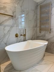 Freestanding bath within complete bathroom refurbishment by Thomson Properties
