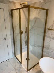 Complete bathroom refurbishment with black fittings by Thomson Properties