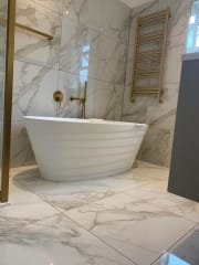 Luxury bathroom refurbishment with freestanding bath by Thomson Properties