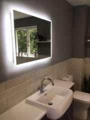 Bathroom lighting, illuminated mirror, fitted by Thomson Properties