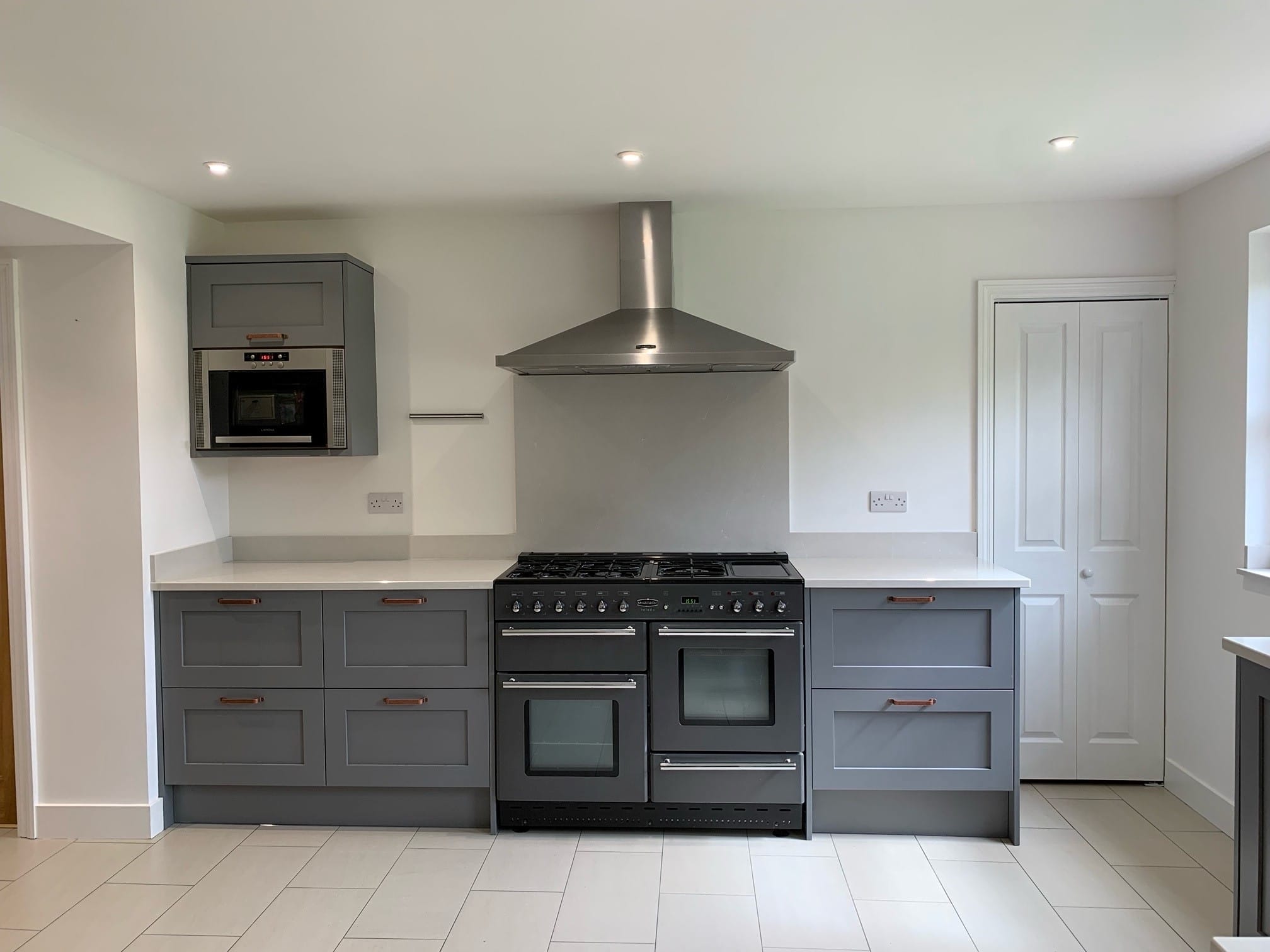 Grey shaker style kitchen installation by Thomson Properties