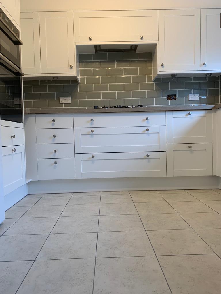 Grey and white kitchen refurbishment by Thomson Properties