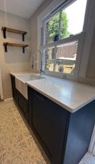 Stone kitchen worktops and patterned floor tiles, kitchen refurbishment, Thomson Properties